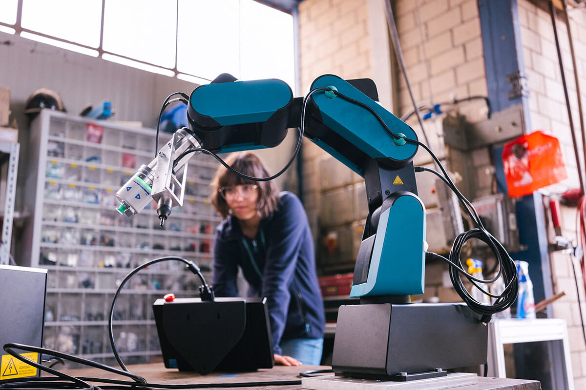 Technician with robot arm